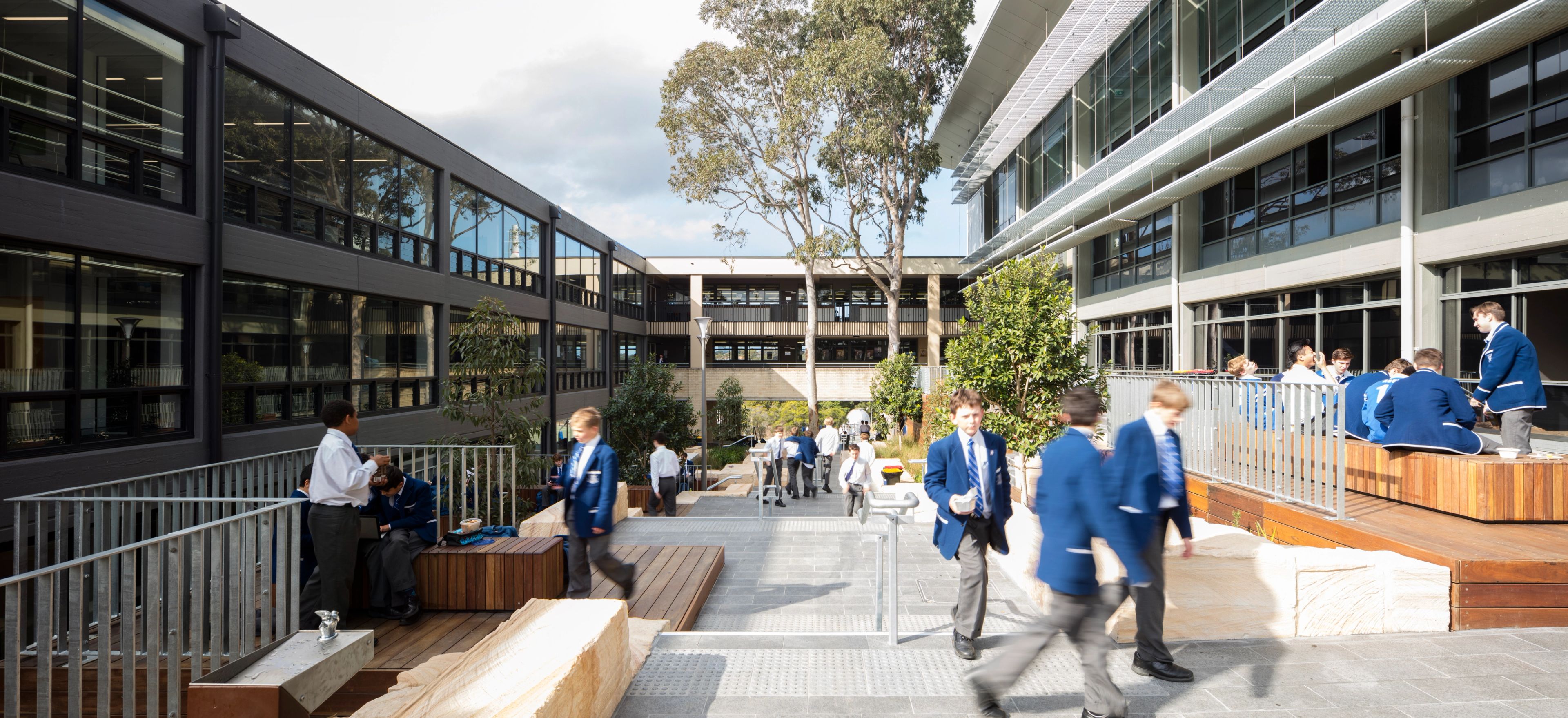 Courtyard view of the Therry Building at St Ignatius' College, featuring landscaped outdoor learning and gathering spaces.
