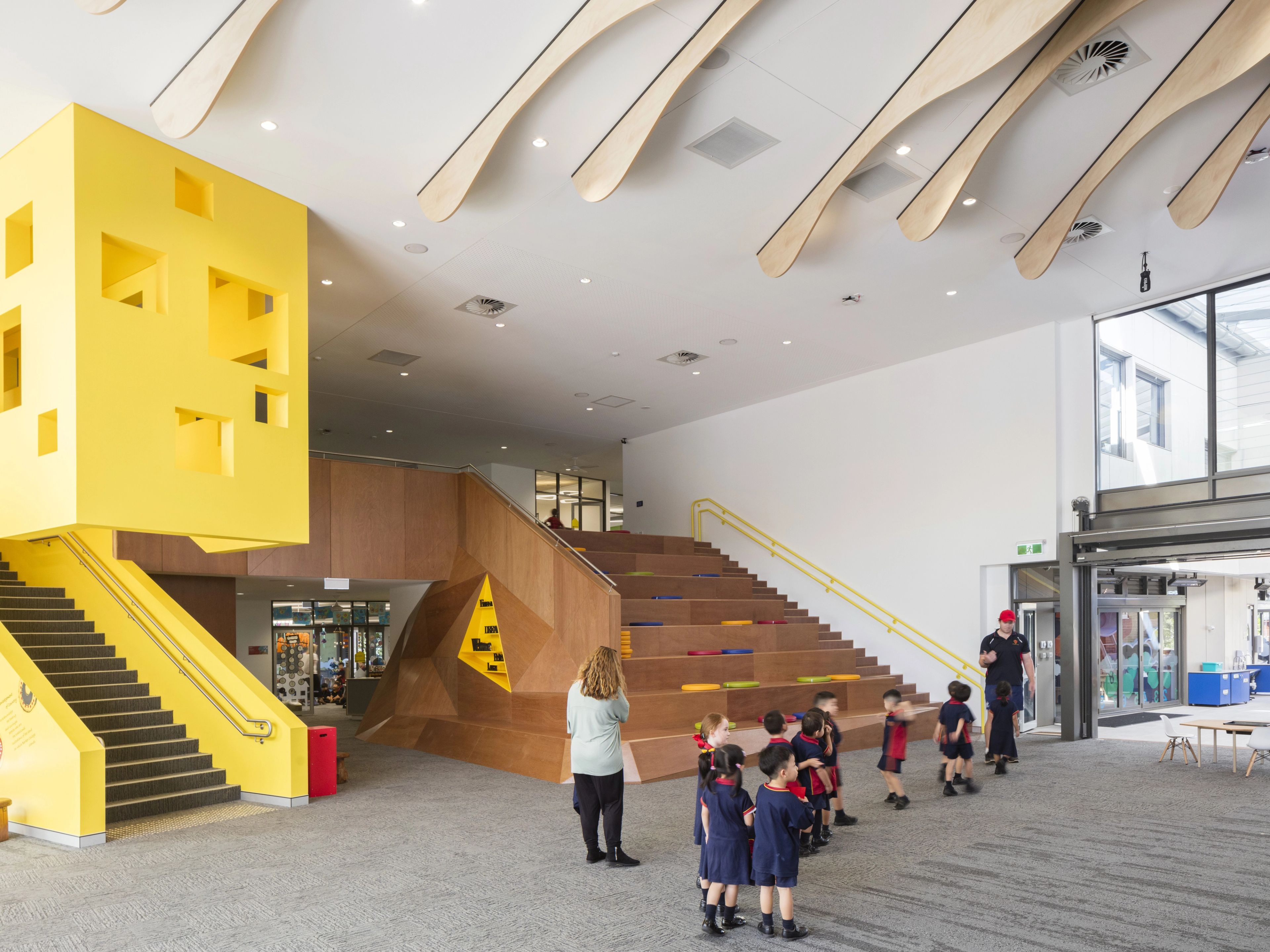 Students gather in the learning commons at the Kurrajong Building, Barker College, featuring flexible learning spaces and contemporary educational design.