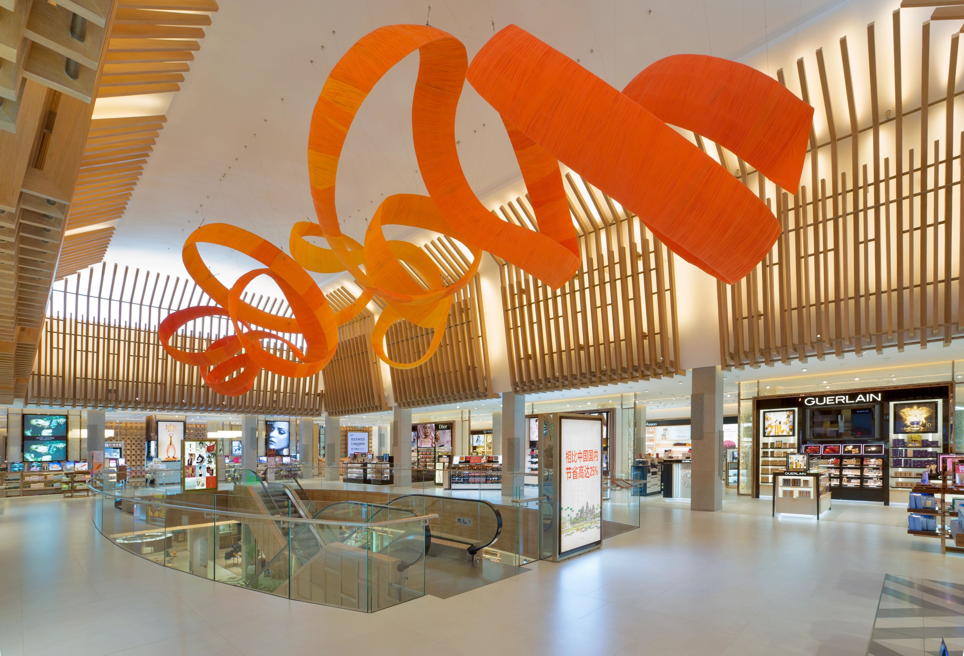 DFS T Galleria Siem Reap showcasing a contemporary luxury retail interior with premium boutiques and central atrium.