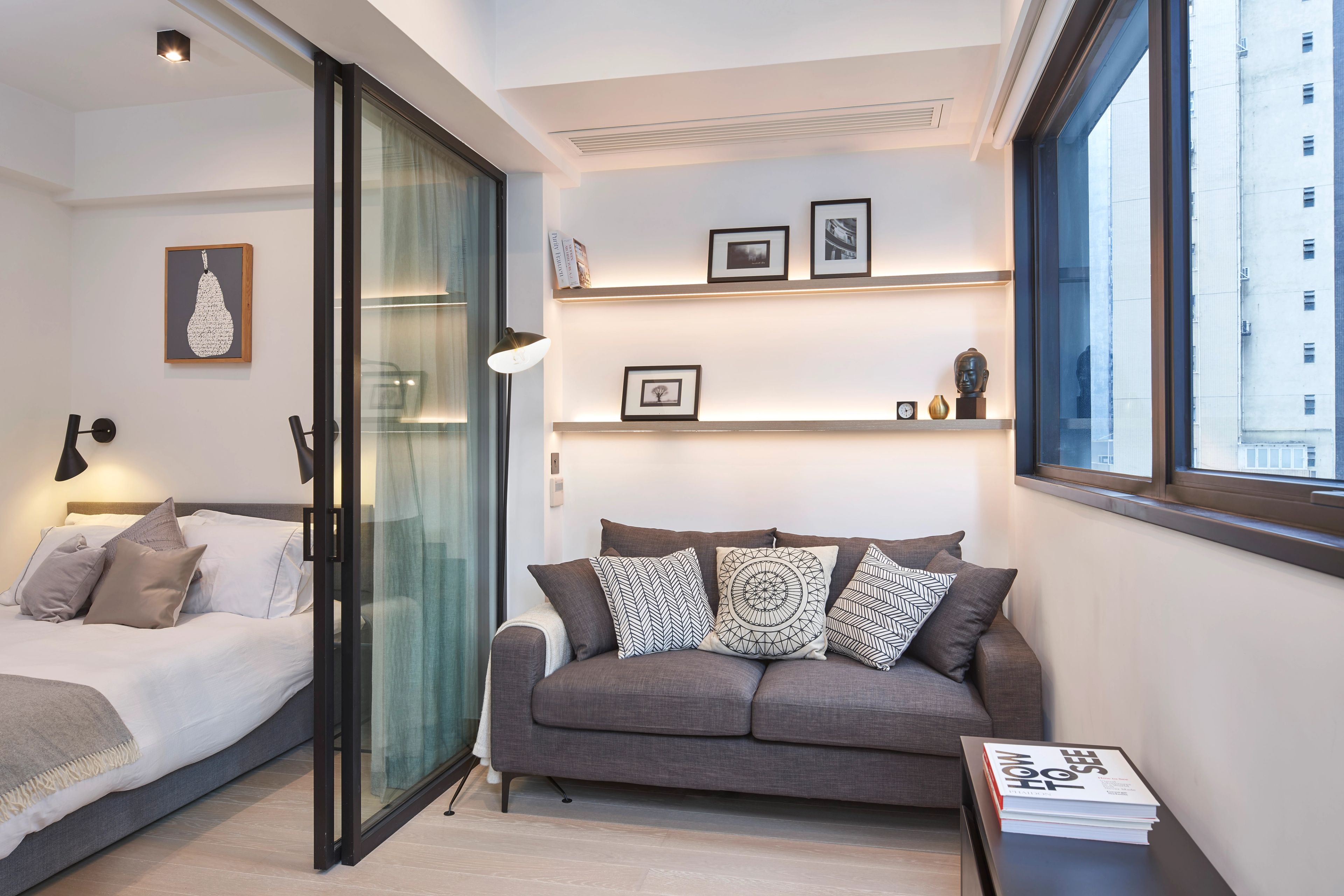 Historic apartment building revitalised with bright, contemporary interiors while retaining its heritage character.