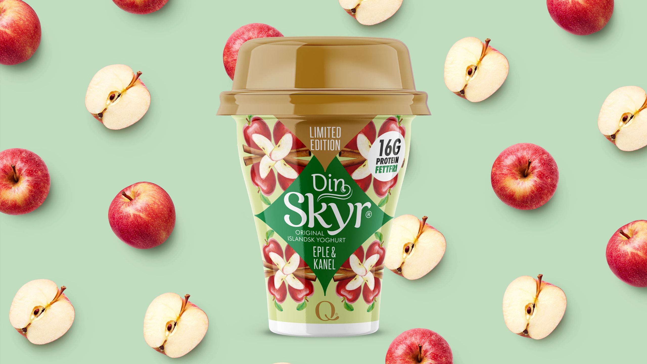 Din Skyr med epler i bakgrunnen