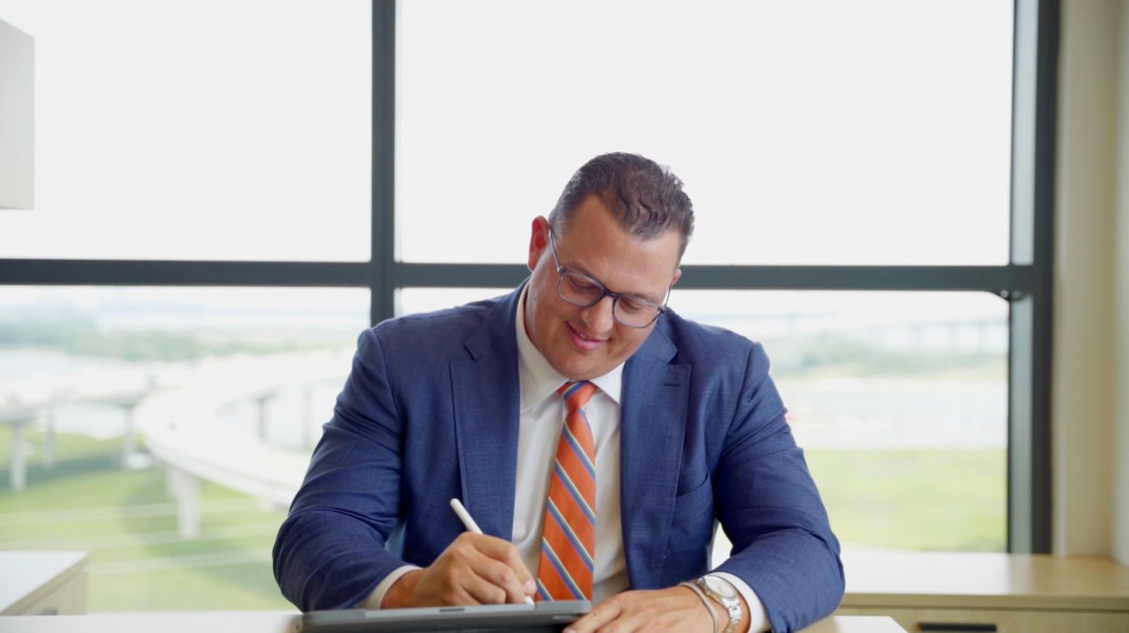 Pinnacle Asset Management — Action executive writing desk