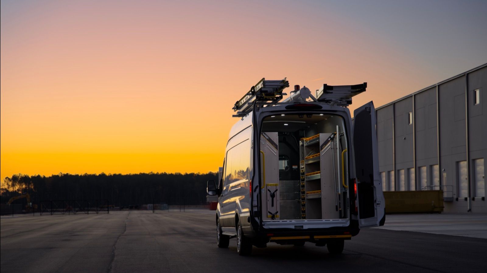 Ranger Design upfitted van at sunset with doors open
