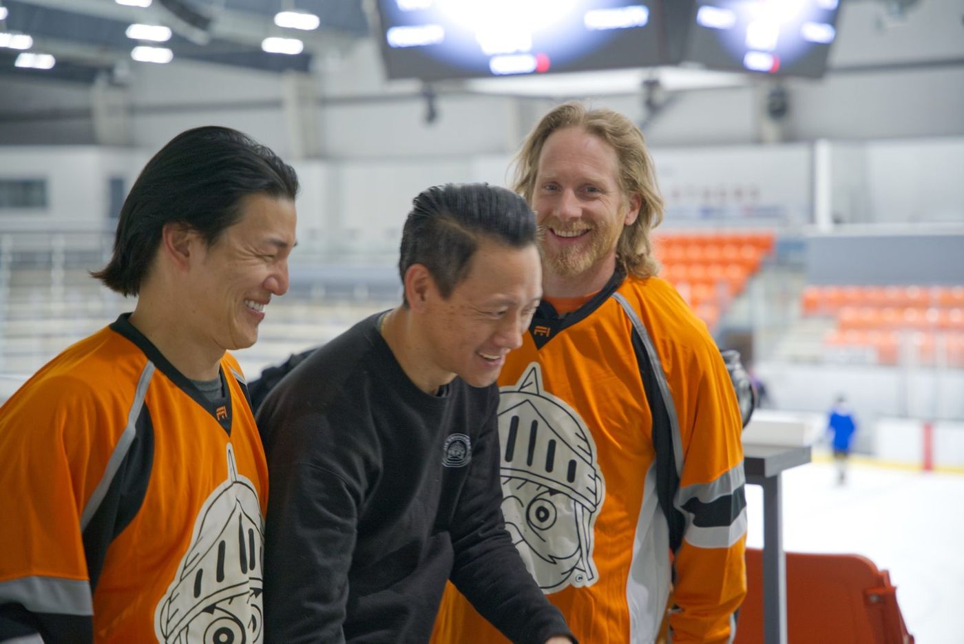Owlverick's team laughing on set at the arena