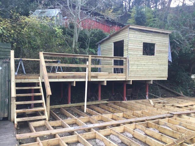 Summerhouse, balustrade, steps and joists during the build