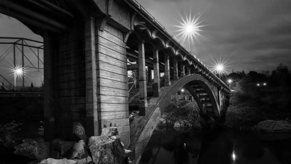 Folsom Rainbow Bridge at night — photograph by Mark Spicer