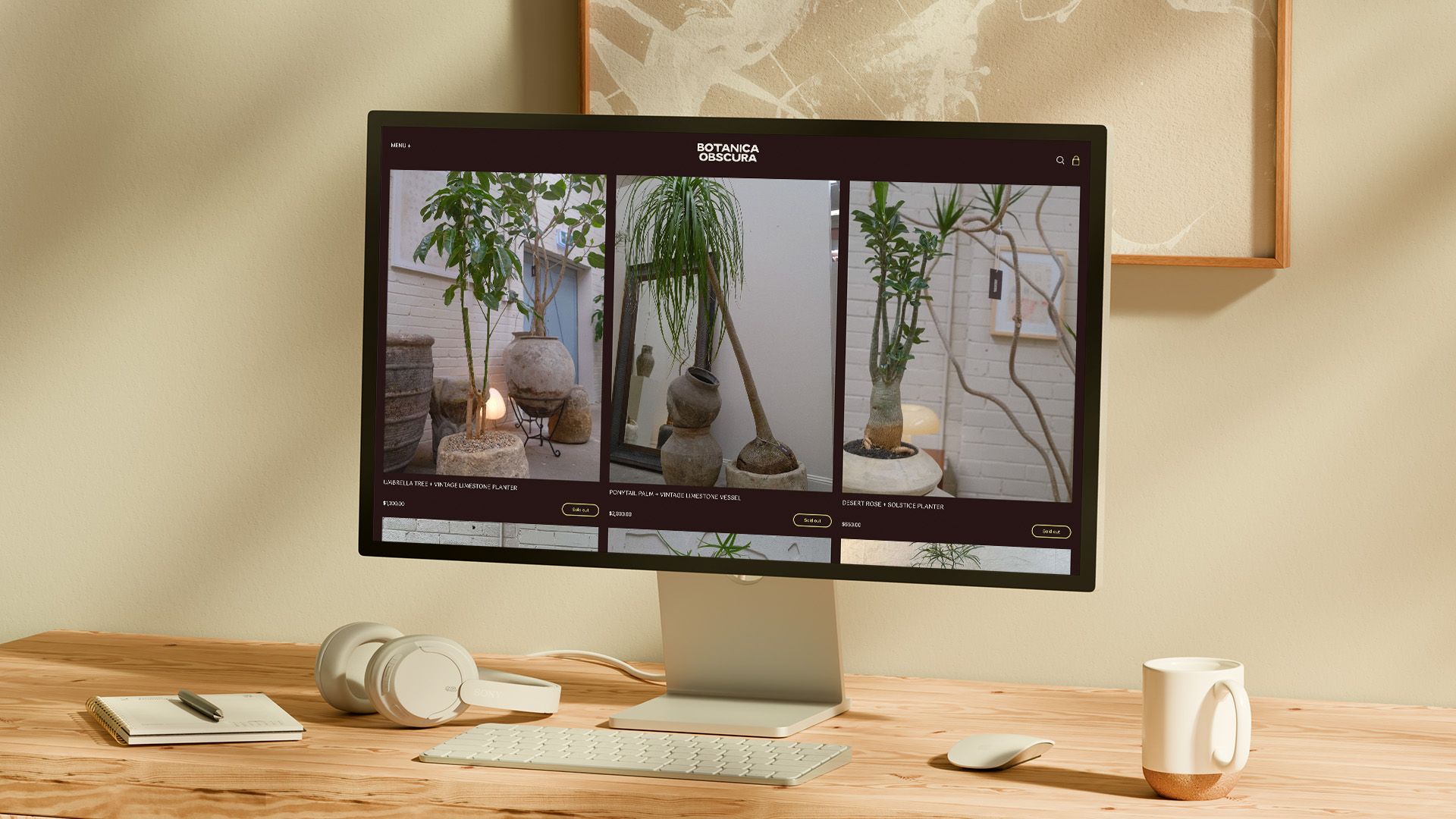 Botanica Obscura website on a large monitor