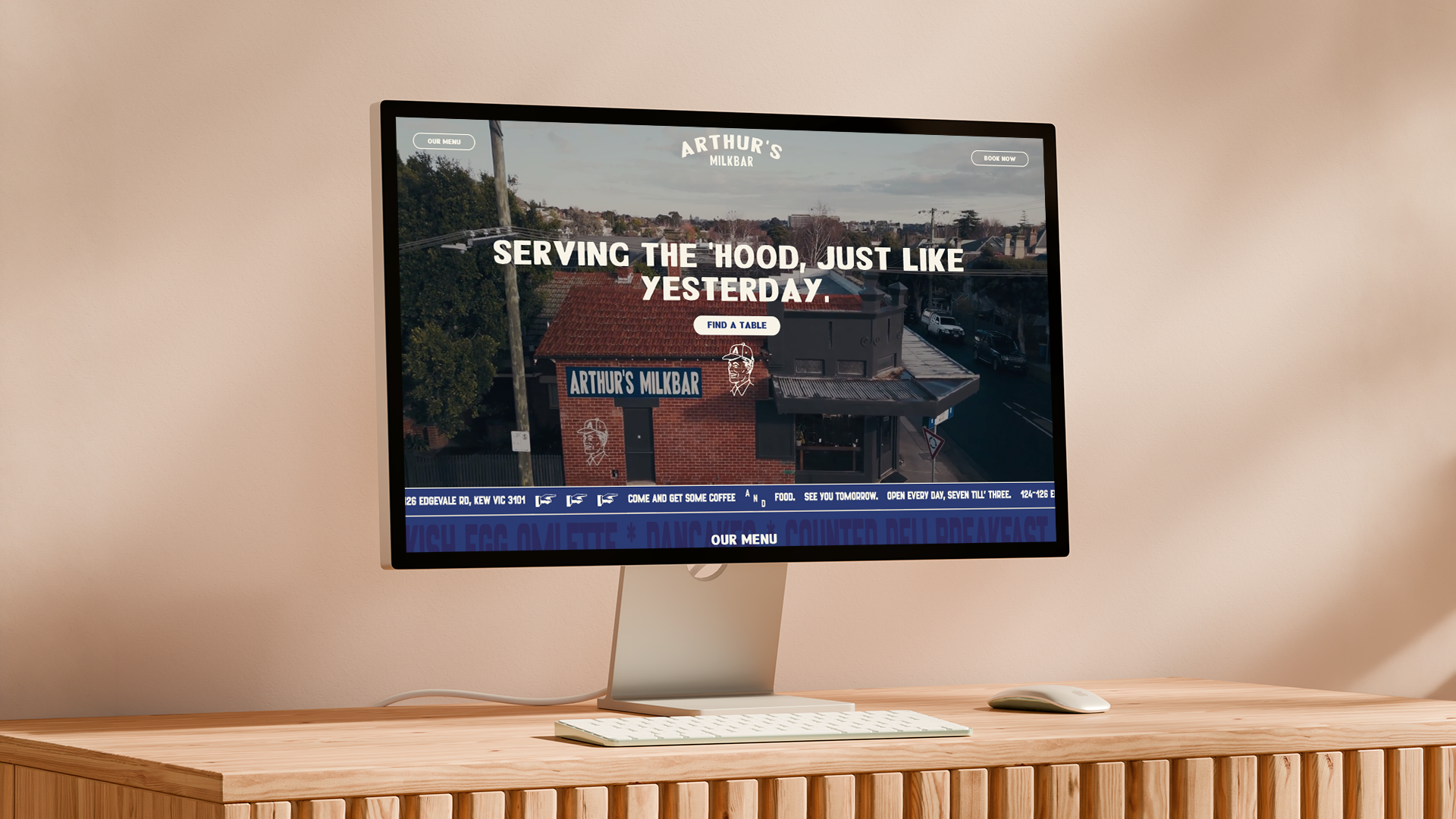 Arthur's Milkbar website on a desktop monitor