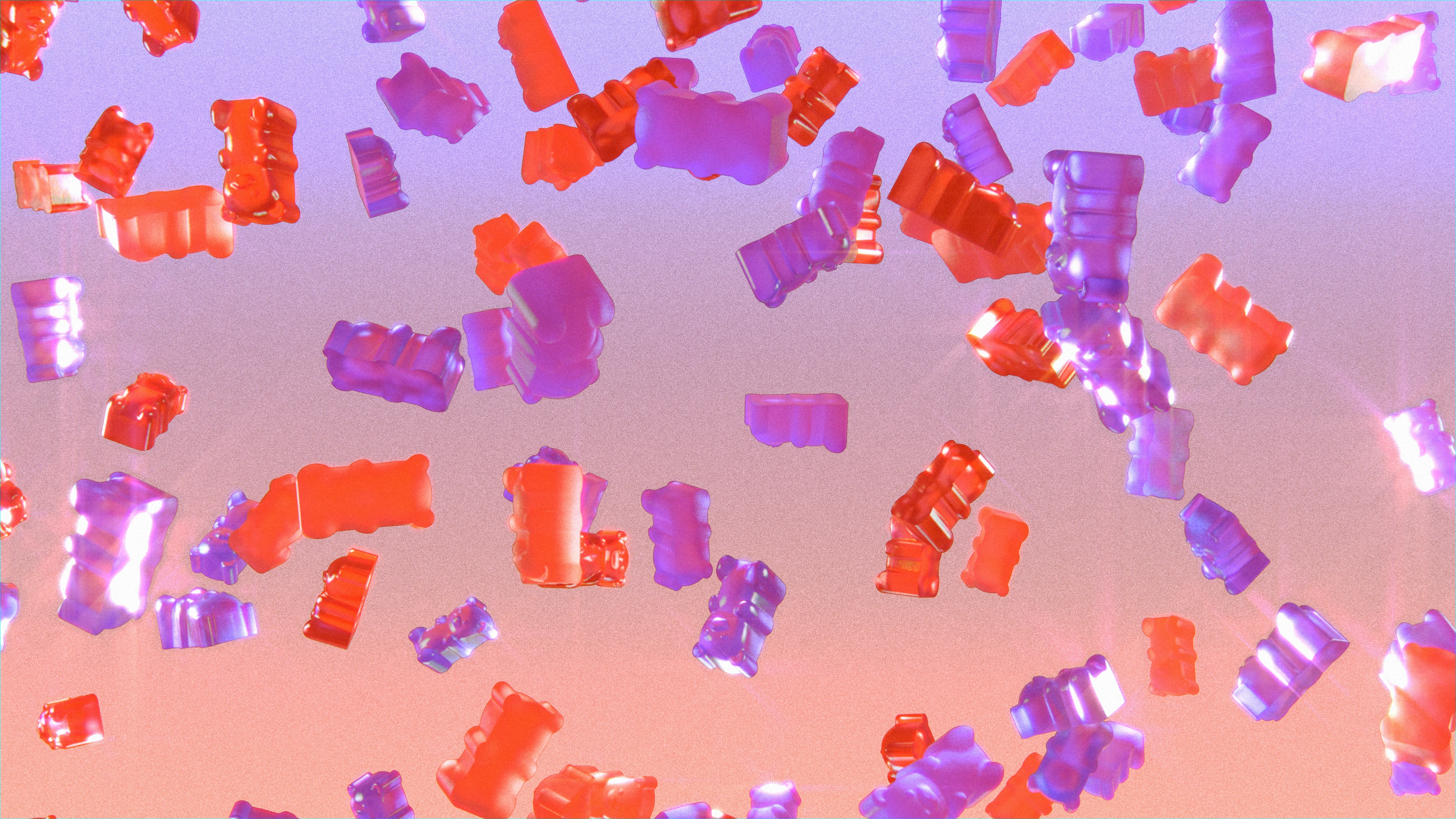 Lots of red and purple gummy bears falling down against a gradient backdrop