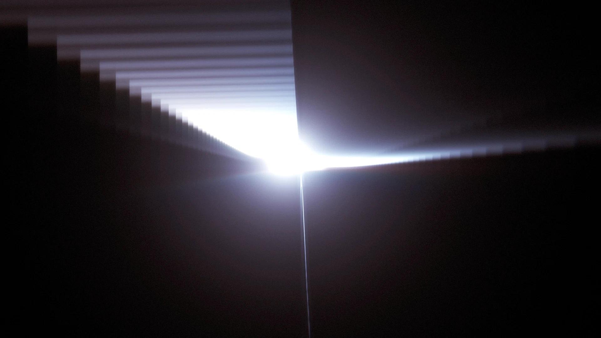White light flare in the middle of black space