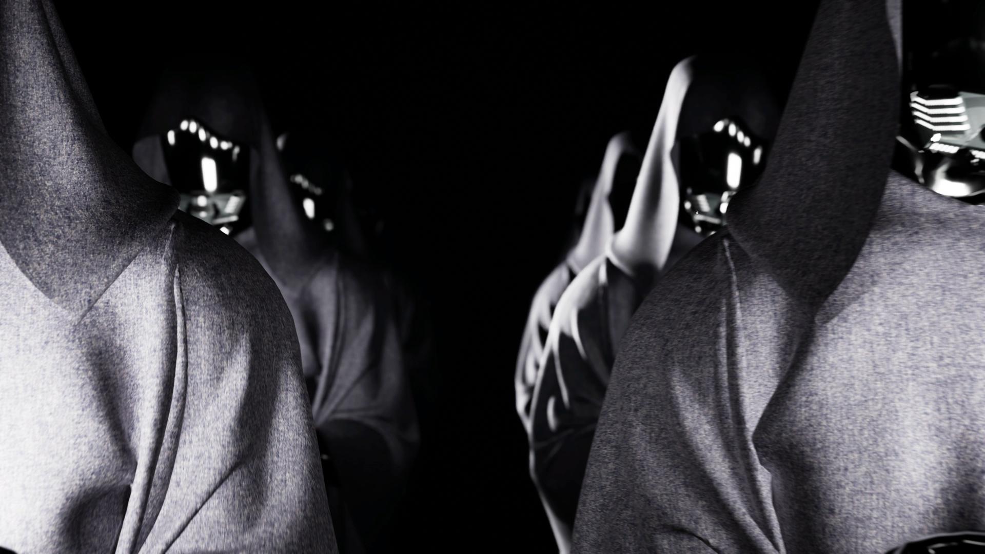 2 rows of cloaked figures walking towards you, with masks on