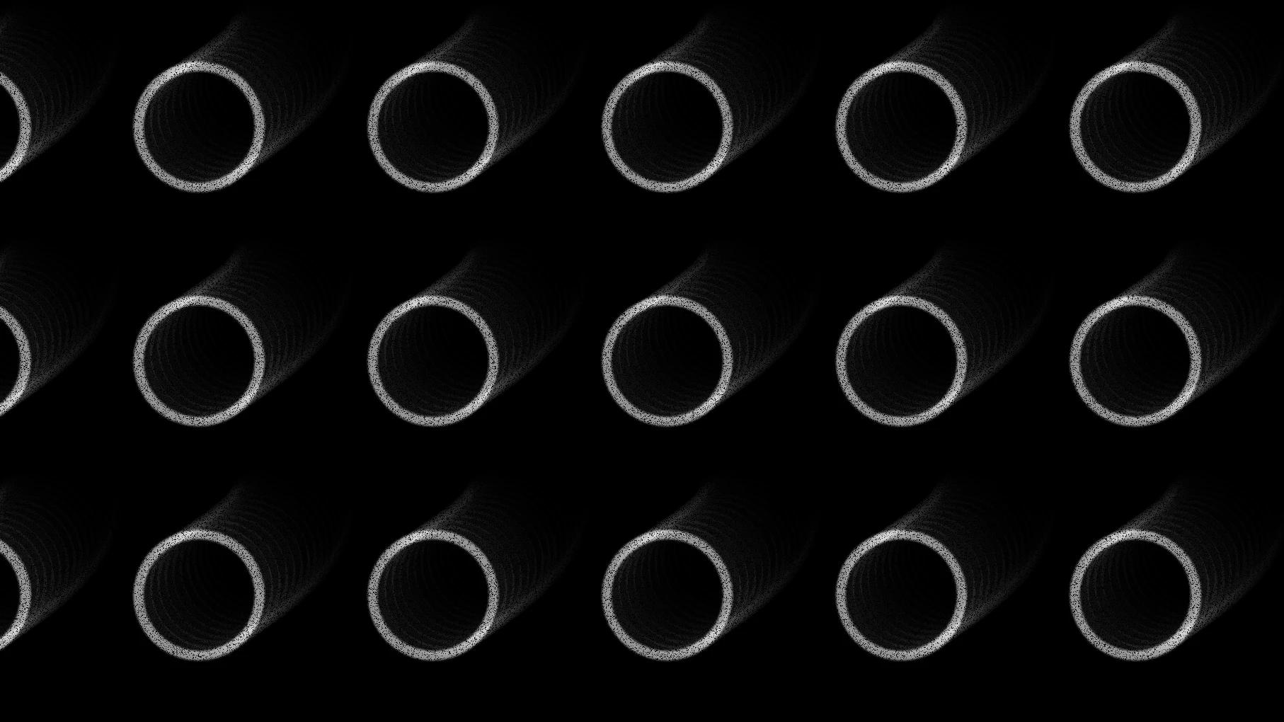 Rows of white grainy circles with identical small light flares
