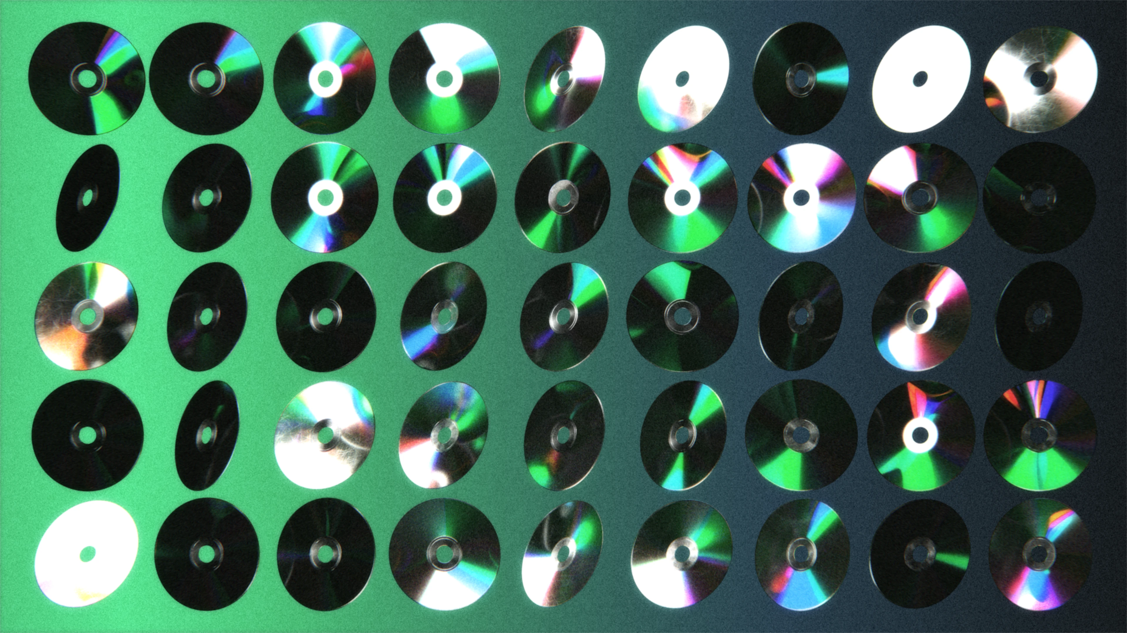Floating CDs rotating in a grid