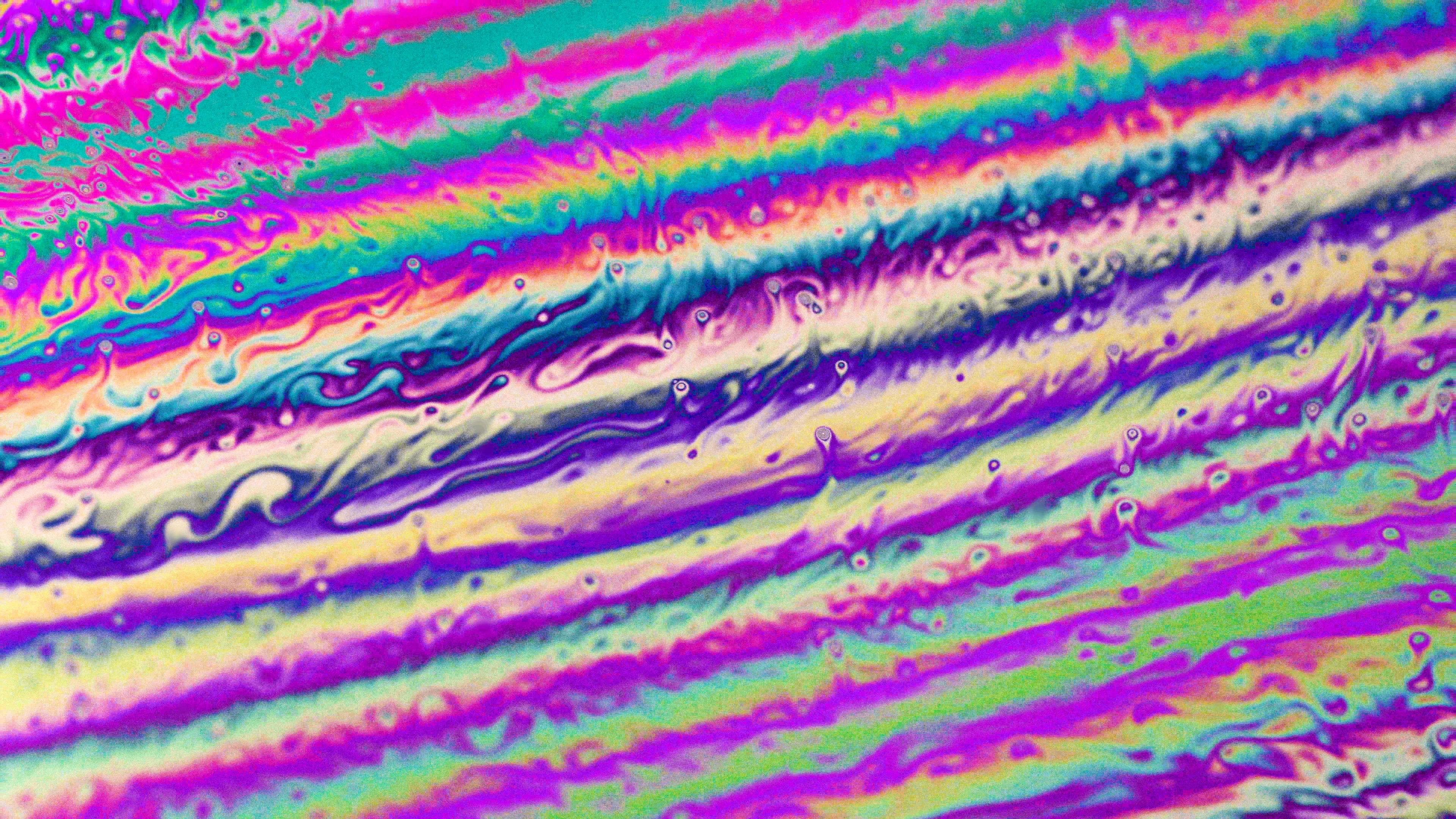 Multicoloured lines with small liquid bubbles in