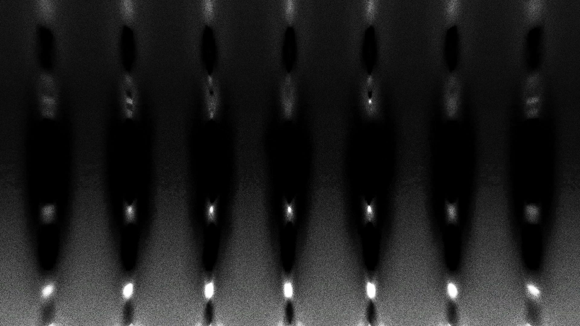 Lines of white dots against a grey, grainy backdrop