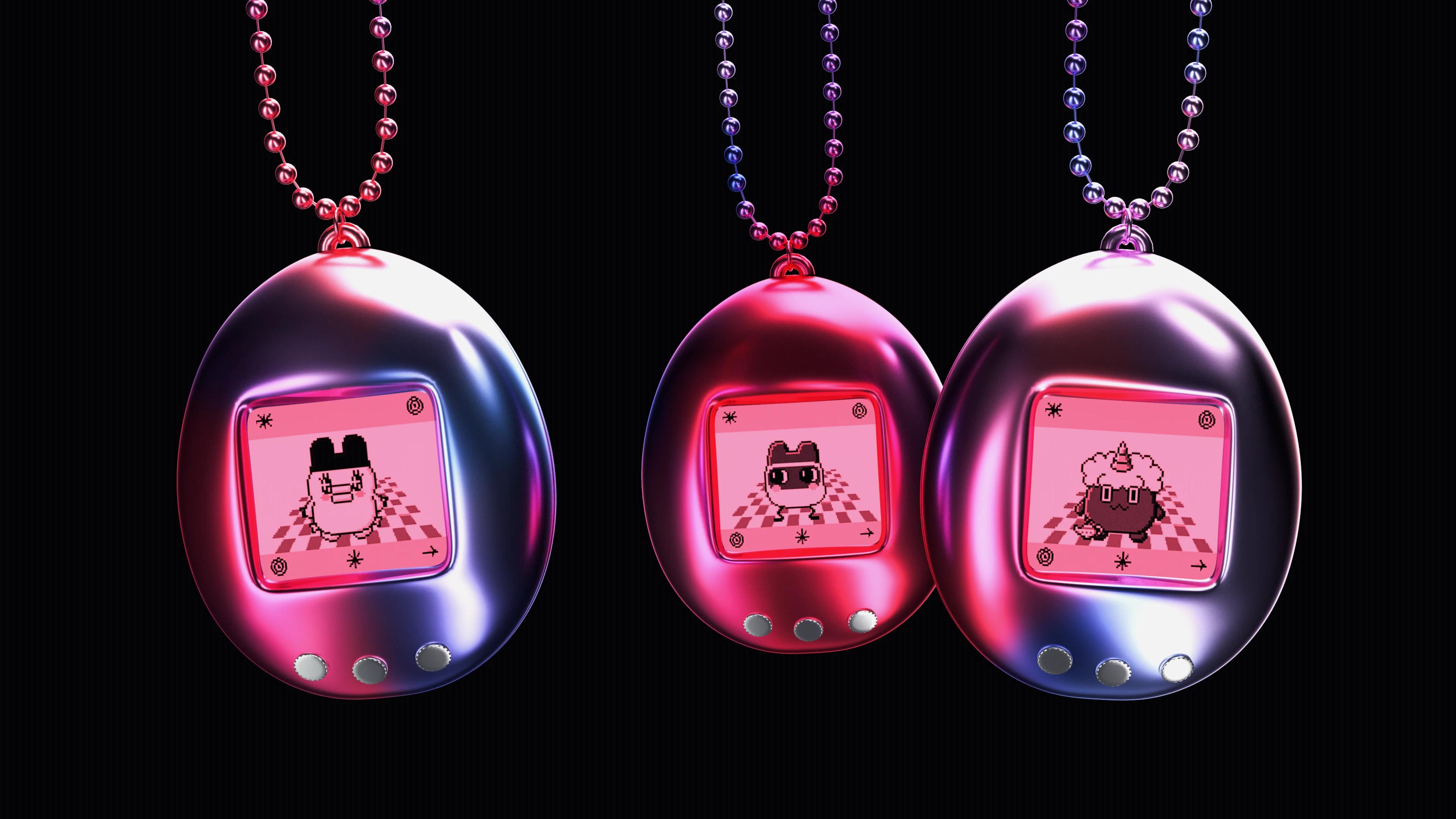 3 shiny metallic 3D tamagotchis swinging next to each other