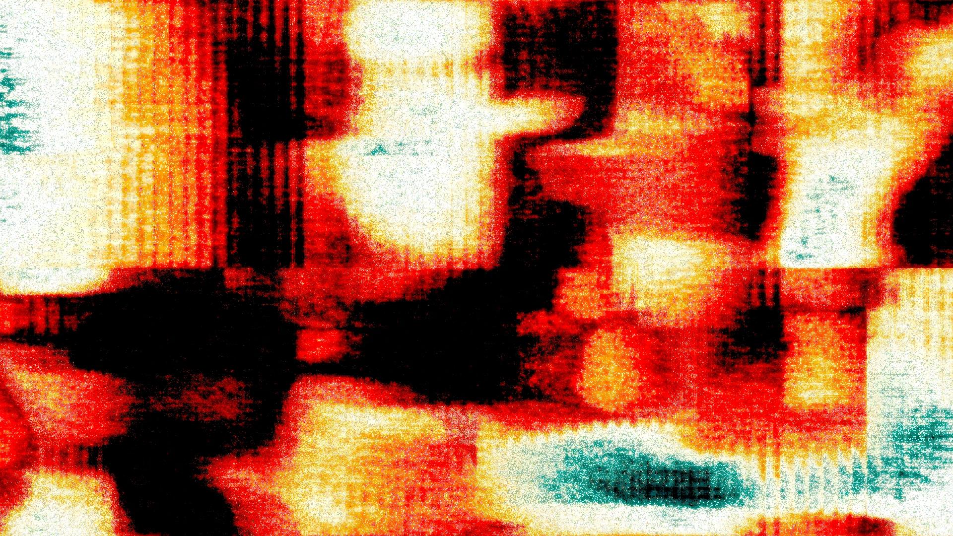 blurry and grainy blobs of orange, yellow and blue
