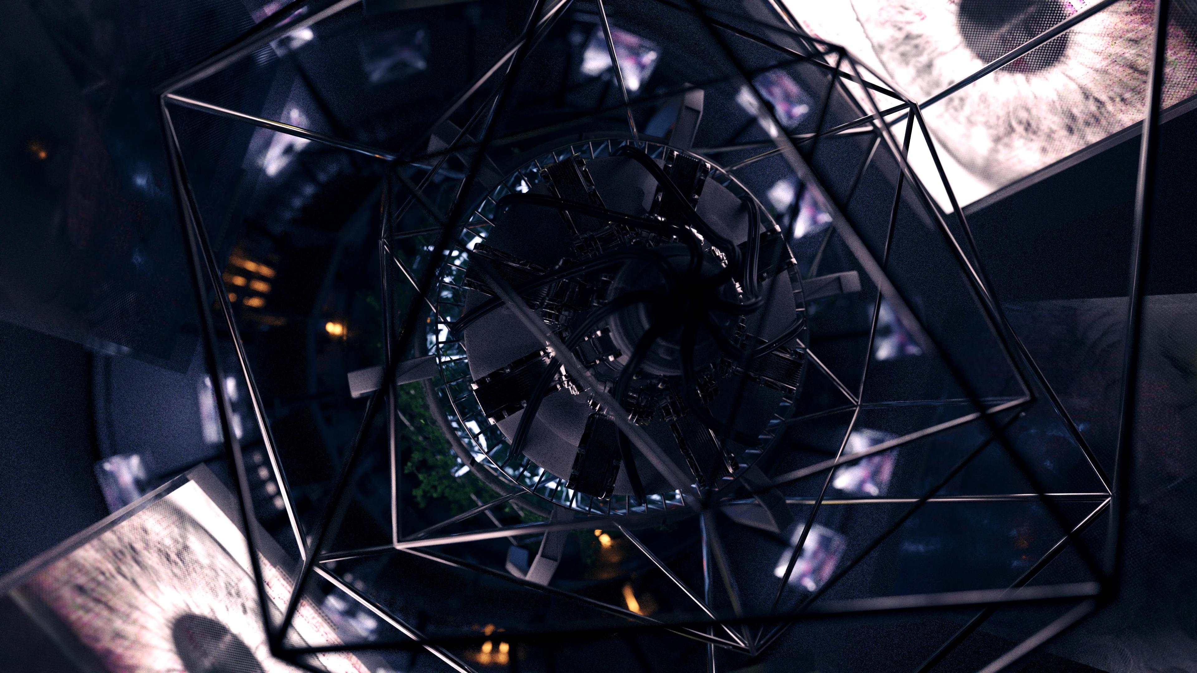 Metal frame surrounded by screens in a dark space