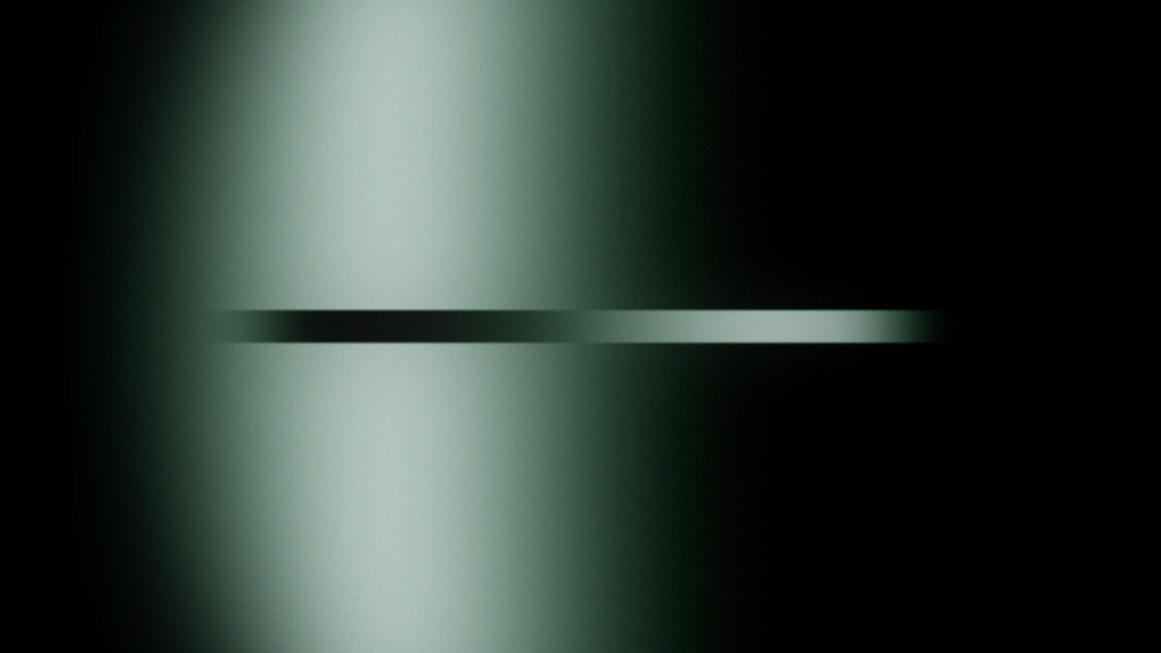 Subtle black and green gradient with a thin line across the middle
