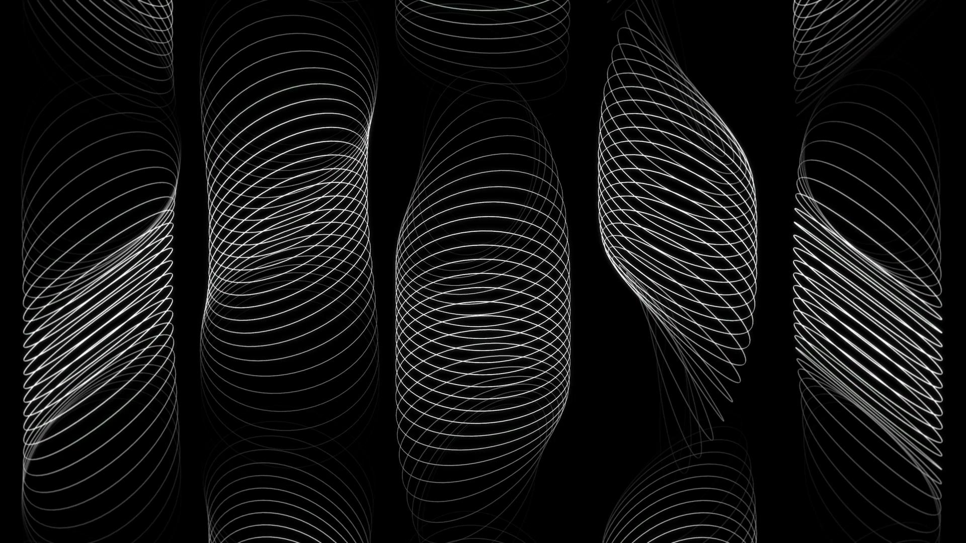 Layers of white circle outlines against black
