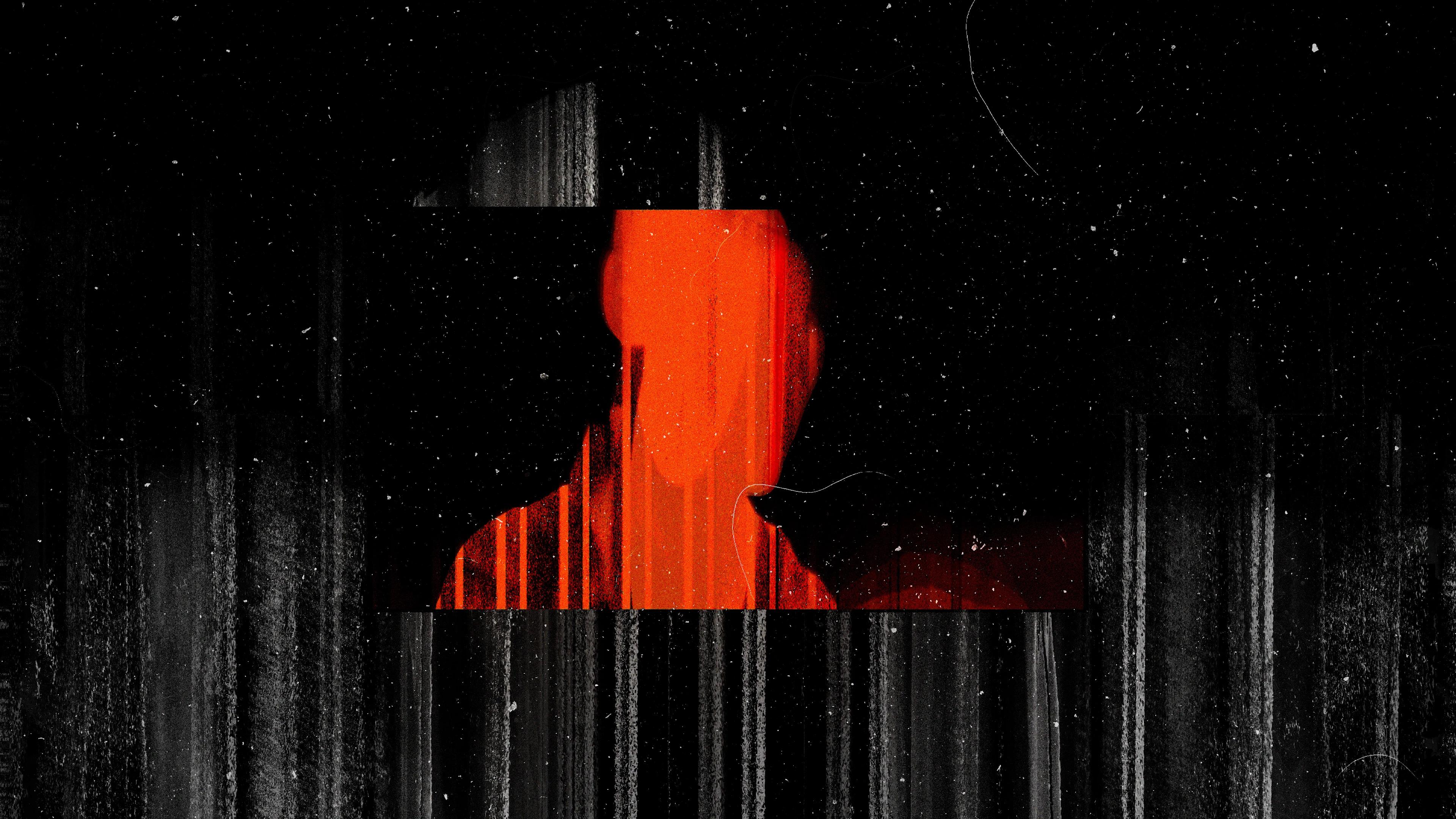 Red figure in black rectangle against glitchy textural background