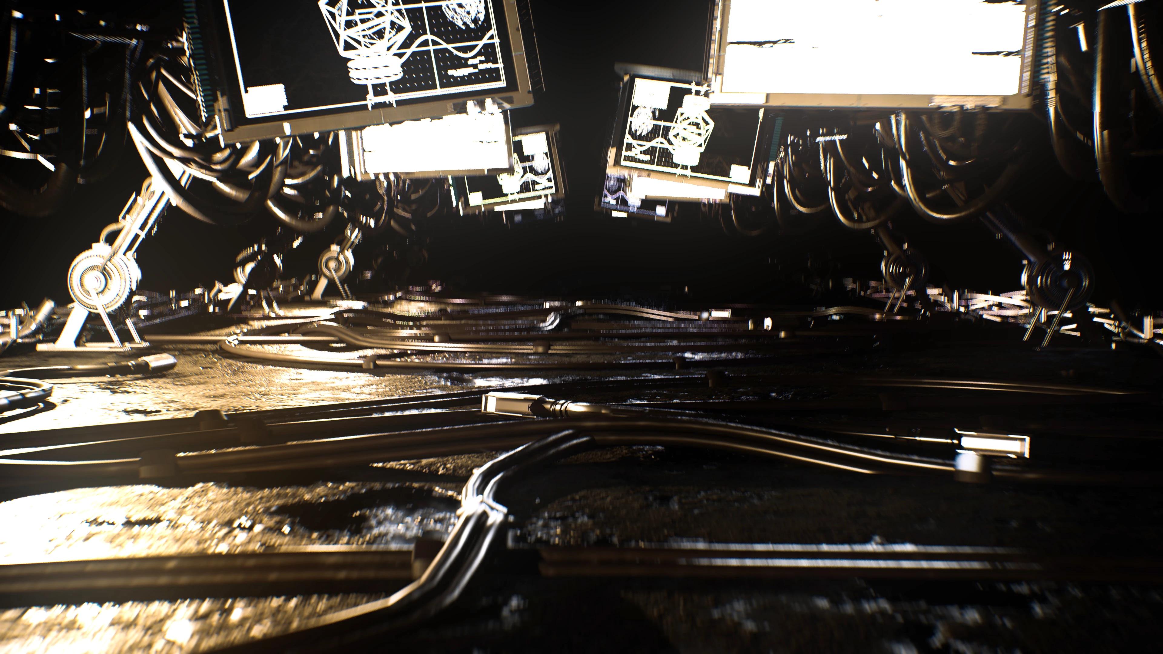 Floor with cables snaking across and TVs at the top