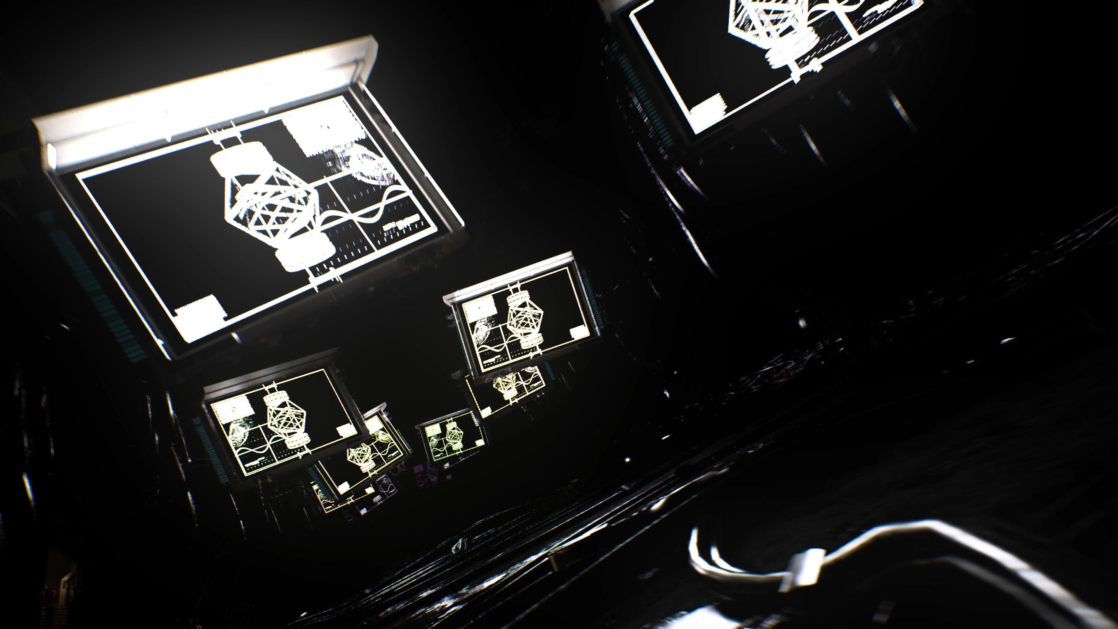 Diagonal shot of TVS in dark room with wireframe objects on screen