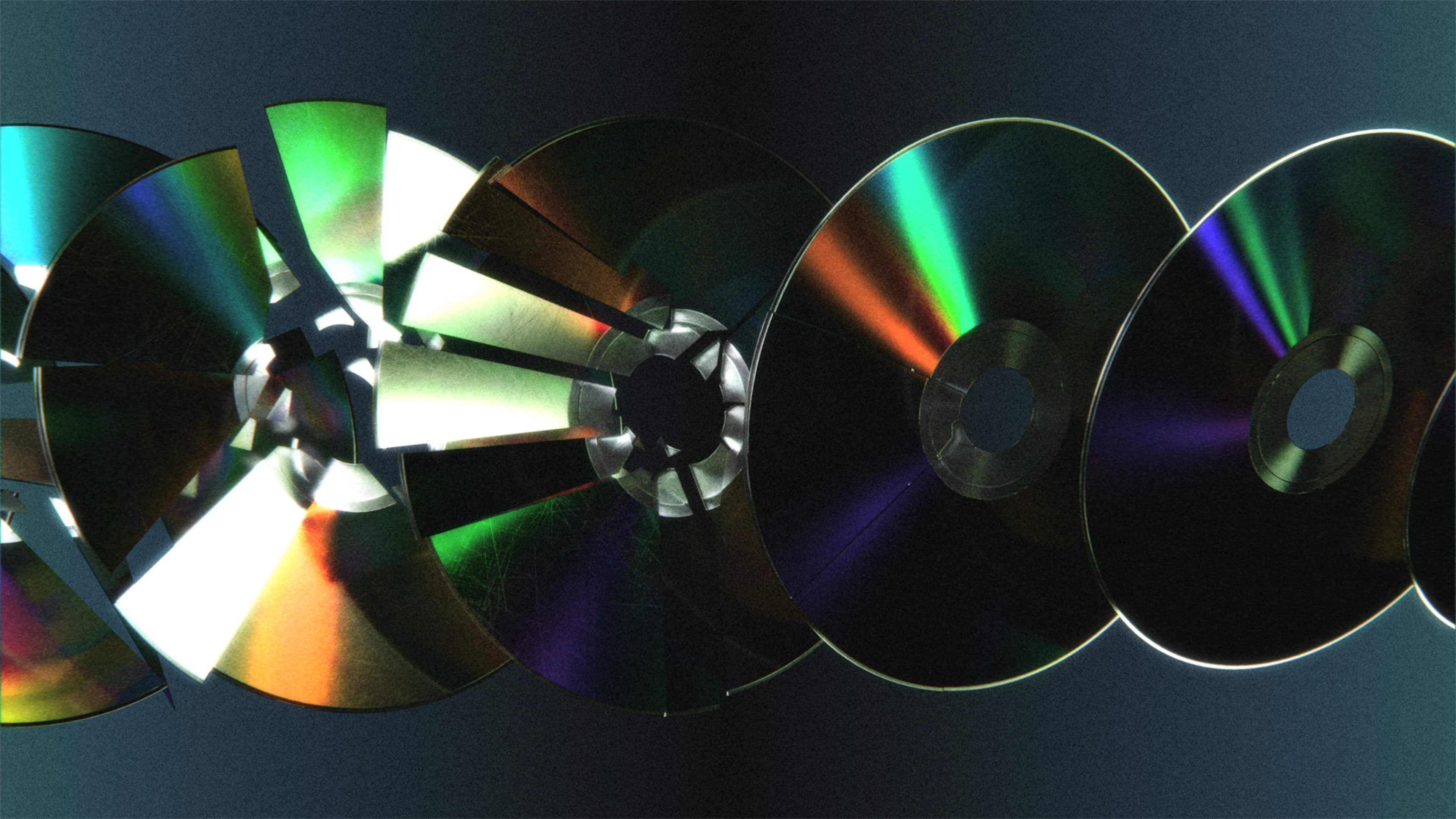 Row of smashing CDs against blue gradient