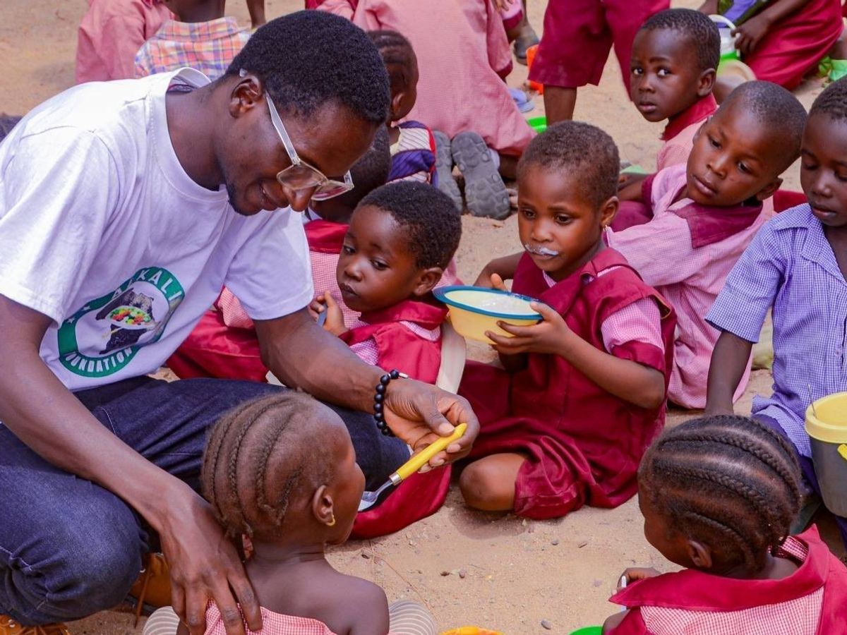 Alkali feeding children.