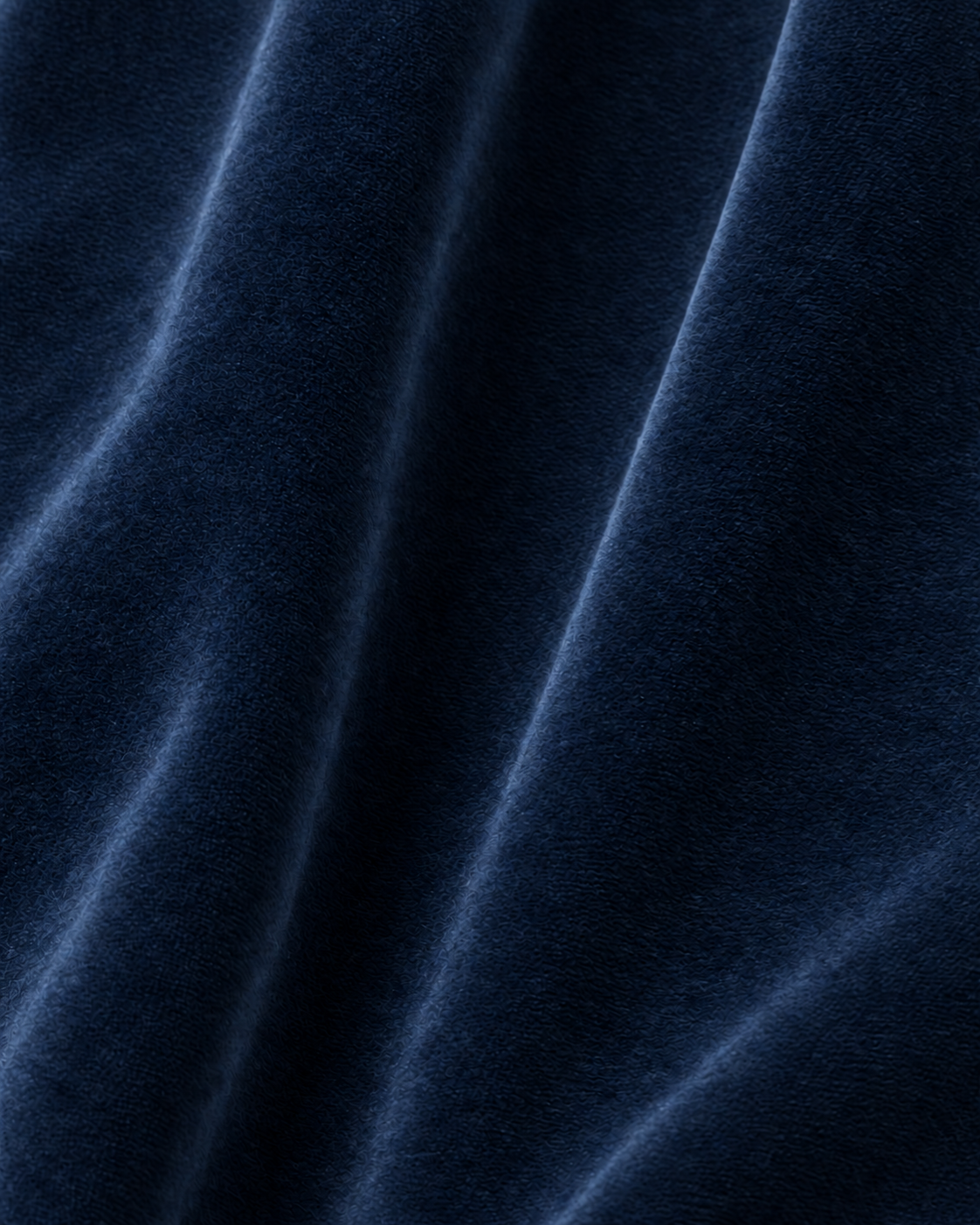 Indigo cotton velvet fabric folds and texture