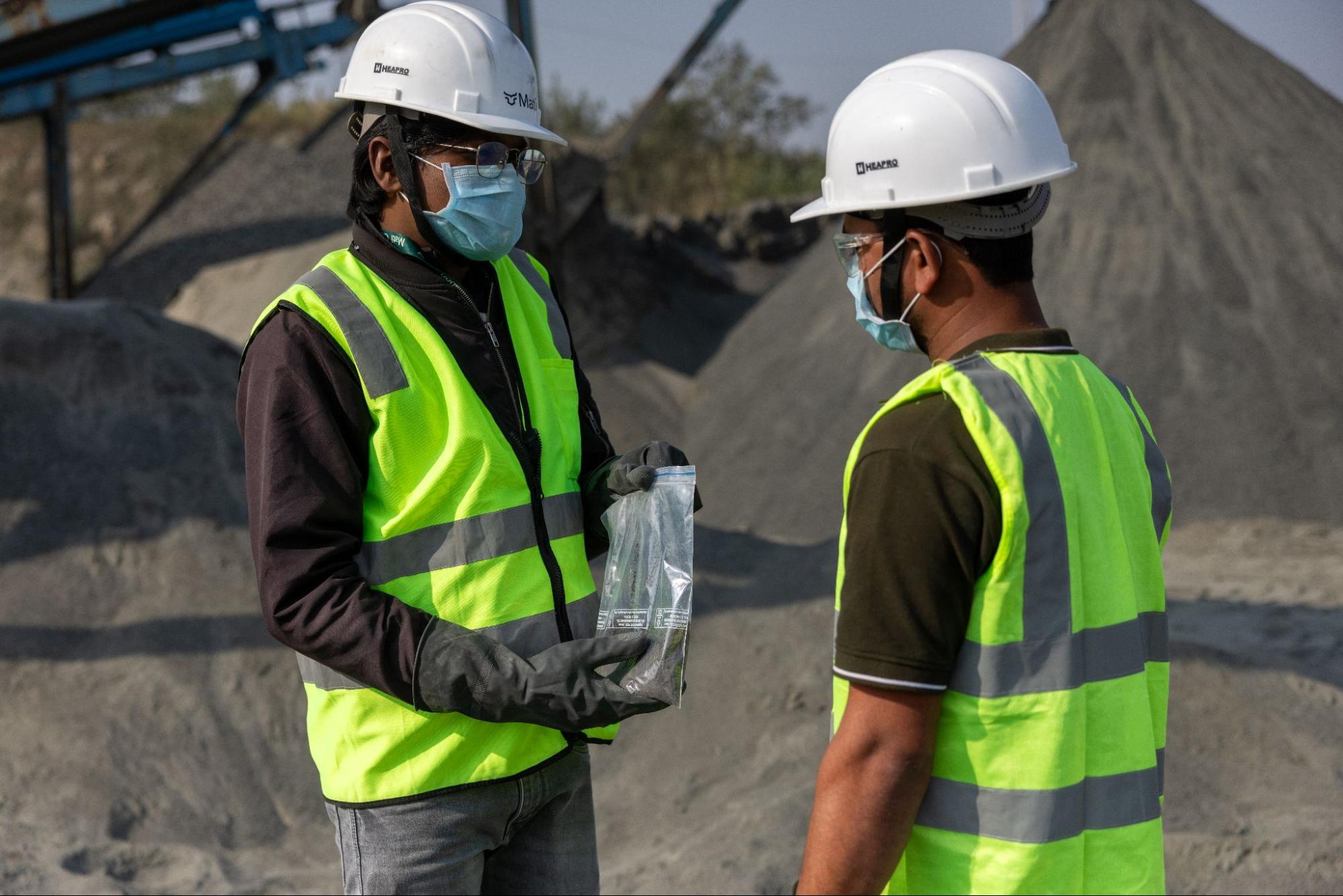 Mati team on site reviewing samples