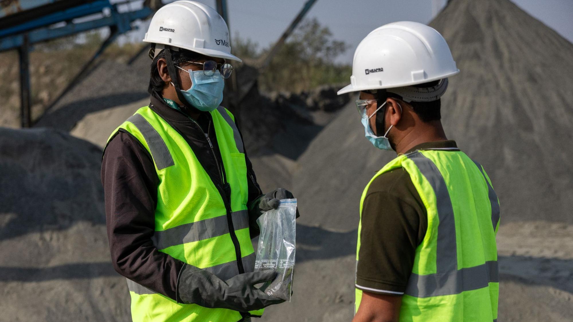 Mati team on site reviewing samples