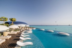 Pool terraces and circular seating beside the water.