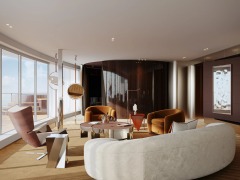 A curved lounge arranged around generous windows and the sea outside.