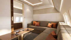 A separate lounge with a sofa, table and integrated storage.
