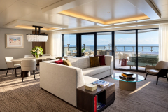 A living and dining area opening onto a private terrace.