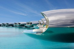 Shebara’s reflective overwater villas above the lagoon.