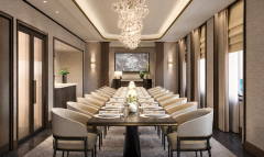 An intimate private dining room with a long table and sculptural lighting.