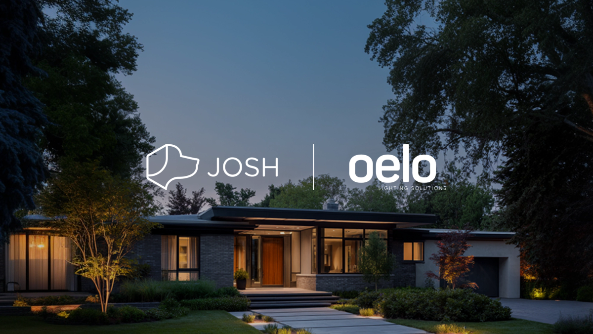 Modern home illuminated by exterior lighting at dusk, featuring Josh.ai and Oelo Lighting Solutions partnership logos