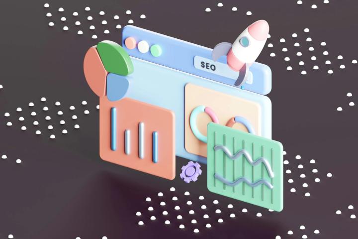 a computer screen with a rocket on top of it