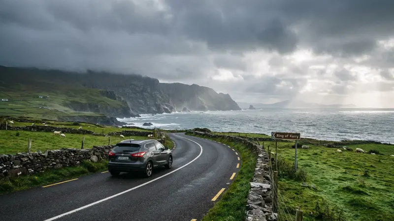 Modern commercial car on a winding coastal road in Ireland with dramatic cliffs and the Atlantic Ocean