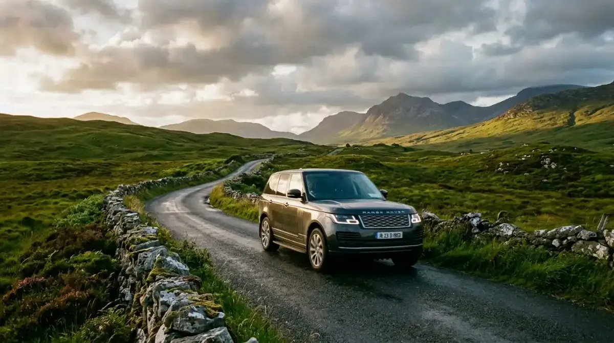 A premium automatic SUV exploring the rugged valleys of western Ireland on a curated self-drive vacation package.