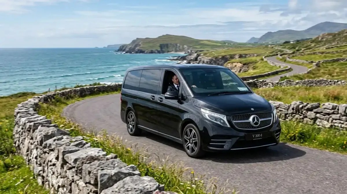 An elite private chauffeur vehicle transporting luxury travelers and golf bags smoothly through the Irish countryside.