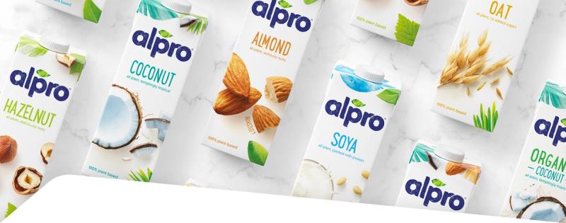 Alpro plant-based milk cartons in hazelnut, coconut, almond, oat and soya varieties displayed together