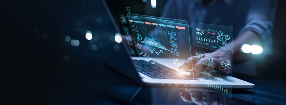 Laptop with a holographic overlay of security and analytics icons