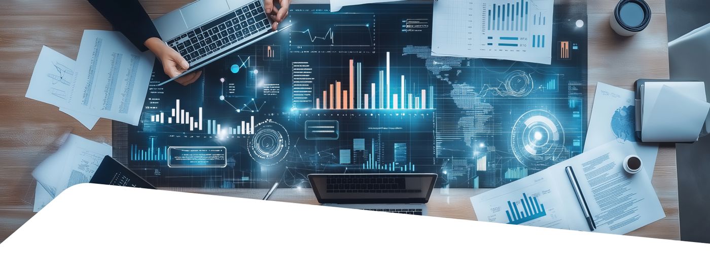 A digital dashboard of charts and graphs overlaid on a busy desk with a laptop and papers