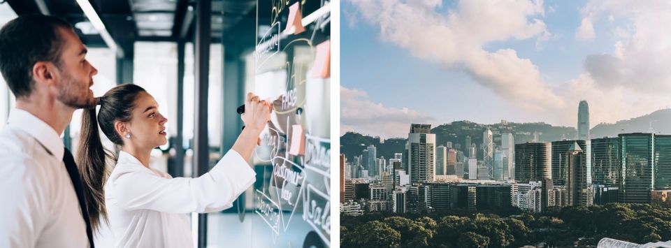 Colleagues planning on a glass whiteboard, alongside the Hong Kong skyline