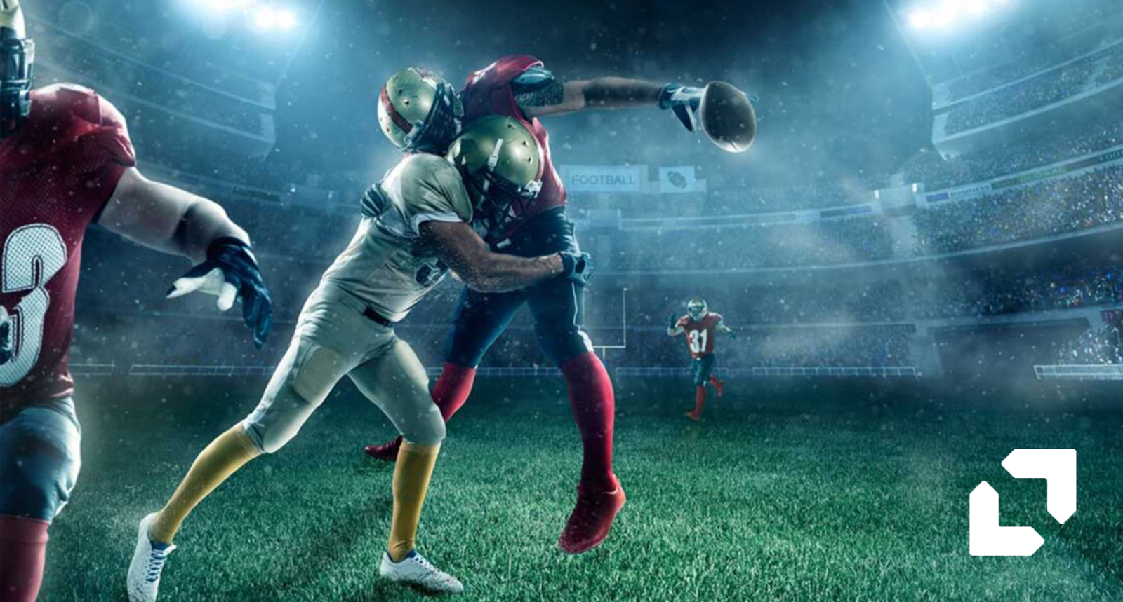 American football players colliding during a tackle