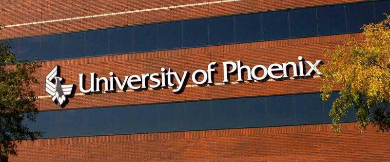 University of Phoenix signage on the exterior of its campus building