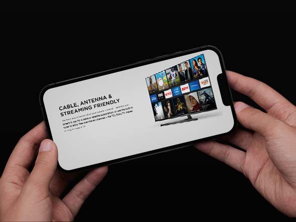 Phone showing TCL's 'Cable, antenna & streaming friendly' feature page